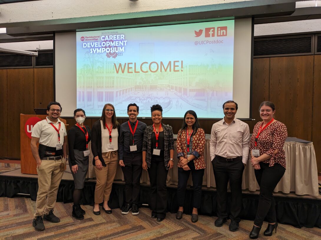 Photo of members of the 2022-2023 PDA Executive Committee and Career Development Symposium Committee at the 2023 PDA Career Development Symposium. L-R: Muhammad Irfan, Lindsey Ramirez, Katie Przybysz, Luis Morae, Natalia Do Couto, Hasmat Buchad, Nitin Minocha, and Valerie Miller